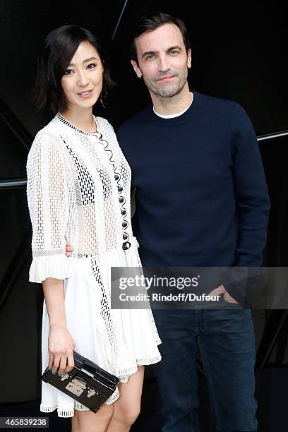 Gwei Lun Mei and Fashion Designer Nicolas Ghesquiere pose after the Louis Vuitton show as part of the Paris Fashion Week Womenswear Fall/Winter...
