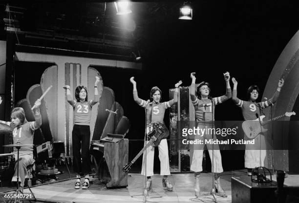 Scottish pop group The Bay City Rollers performing on the BBC TV music show 'Top Of The Pops', London, 7th March 1974. Left to right: Derek Longmuir,...