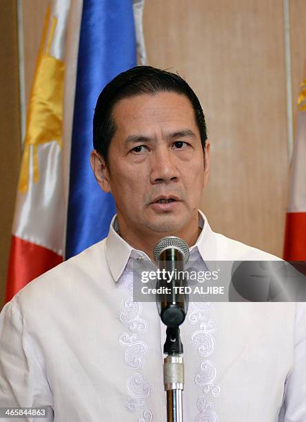 Philippine Foreign Affairs Department spokesman, assistant secretary Raul Hernandez reads a statement in Manila on January 30 after the Hong Kong...