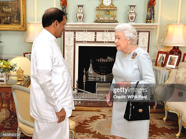 The President of Sri Lanka Mr Maithripala Sirisena meets Queen Elizabeth II during a private audience at Buckingham Palace on March 11, 2015 in...