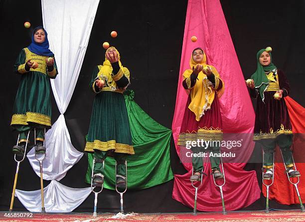 Internally displaced Afghan children perform during a graduation ceremony organized by the Mobile Mini Circus for Children in Kabul, Afghanistan...