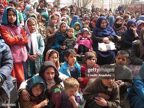 Internally displaced Afghan children attend a graduation ceremony organized by the Mobile Mini Circus for Children in Kabul, Afghanistan March 11,...