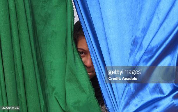 An Internally displaced Afghan child is seen during a graduation ceremony organized by the Mobile Mini Circus for Children in Kabul, Afghanistan...