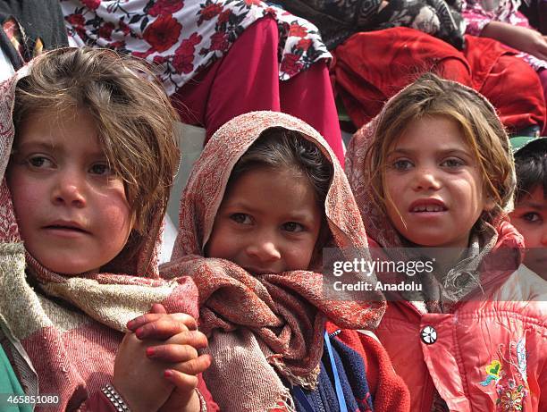 Internally displaced Afghan children attend a graduation ceremony organized by the Mobile Mini Circus for Children in Kabul, Afghanistan March 11,...