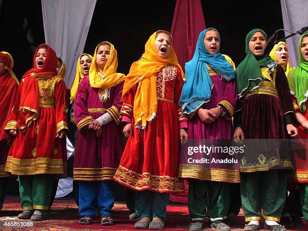 Internally displaced Afghan children perform during a graduation ceremony organized by the Mobile Mini Circus for Children in Kabul, Afghanistan...