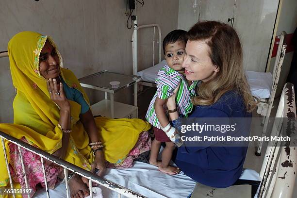 Journalist and former first lady to France's President Francois Hollande, Valerie Trierweiler is photographed for Paris Match during a humanitarian...