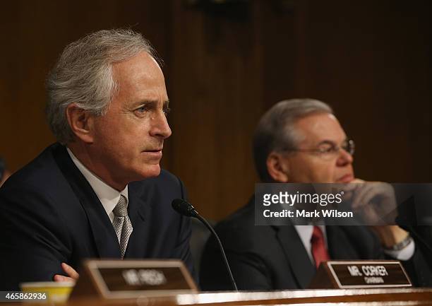 Chairman Sen. Bob Corker and ranking member Sen. Bob Menendez listen to testimony during a Senate Foreign Relations Committee hearing on Capitol...
