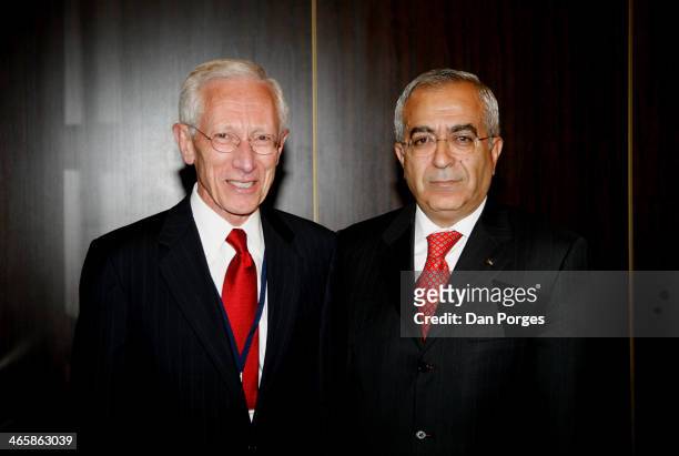 Former Governor of the Bank of Israel Professor Stanley Fischer talks with former Prime Minister of the Palestinian Authority Salam Fayyad during a...