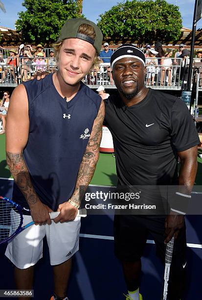 Musician Justin Bieber and comedian Kevin Hart attend the 11th Annual Desert Smash Hosted By Will Ferrell Benefiting Cancer For College at La Quinta...