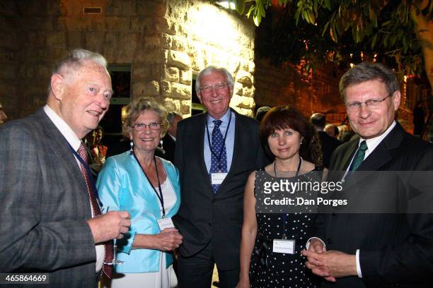 Pictured during a conference of the Group of Thirty hosted by the Bank of Israel and held at the King David Hotel are, unidentified , Lise Rafaelson...