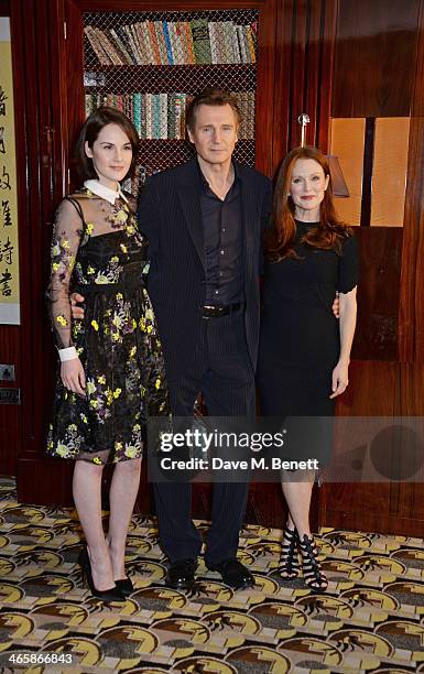 Michelle Dockery, Liam Neeson and Julianne Moore attend a photocall for "Non-Stop" at China Tang at The Dorchester on January 30, 2014 in London,...