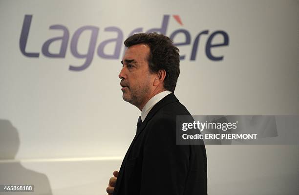 French media group Lagardere Chief Executive Arnaud Lagardere arrives to give a press conference to present the group's 2014 results on March 11,...