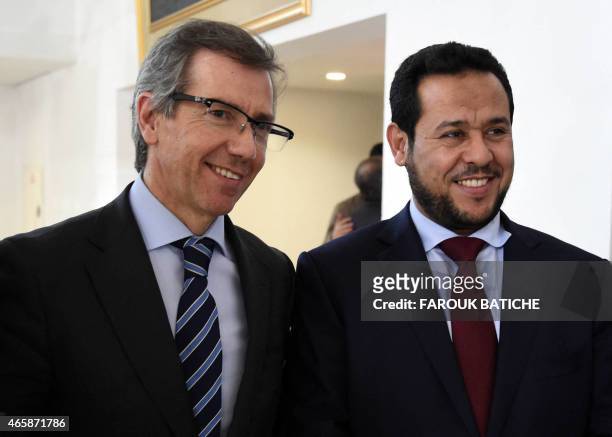 United Nations Special Representative and Head of the United Nations Support Mission in Libya, Bernardino Leon , stands next to former president of...