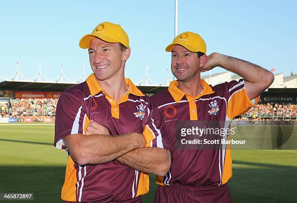 Ricky Ponting talks with AFL footballer Brent Harvey during the Ricky Ponting Tribute Match at Aurora Stadium on January 30, 2014 in Launceston,...
