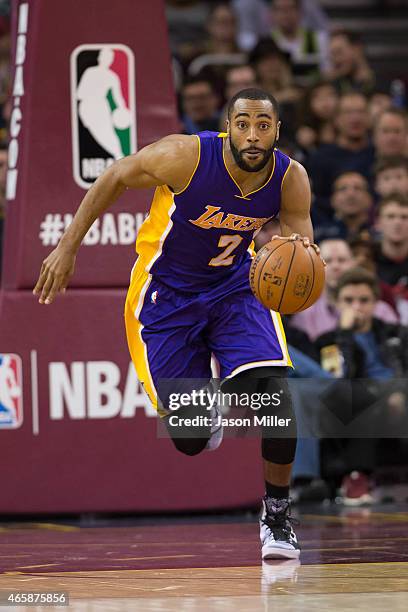 Wayne Ellington of the Los Angeles Lakers drives during the first half against the Cleveland Cavaliers at Quicken Loans Arena on February 8, 2015 in...