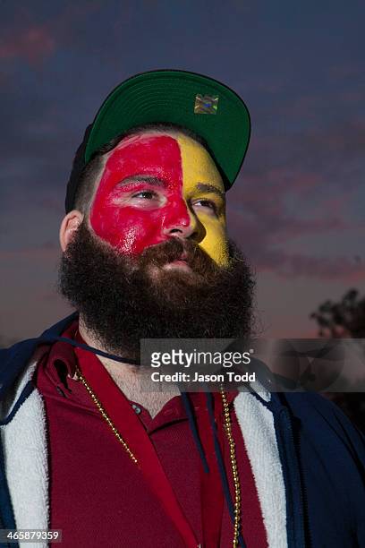 young bearded sports fanatic man in facepaint - face paint stock pictures, royalty-free photos & images