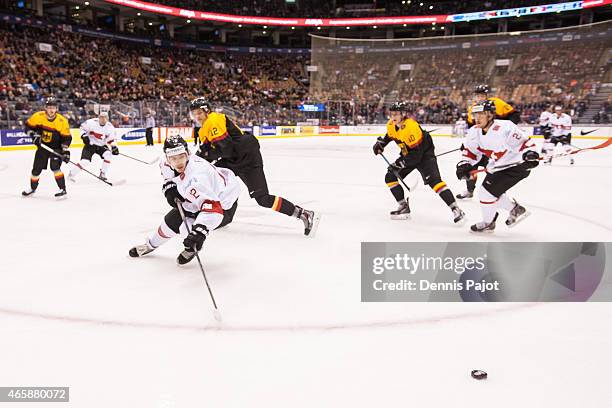 Forward Jason Fuchs of Switzerland skates against Germany during the 2015 IIHF World Junior Championship on January 03, 2015 at the Air Canada Centre...