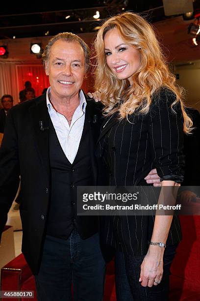 Main guest of the show Humorist Michel Leeb and Adriana Karembeu attend the 'Vivement Dimanche' French TV at Pavillon Gabriel on March 11, 2015 in...