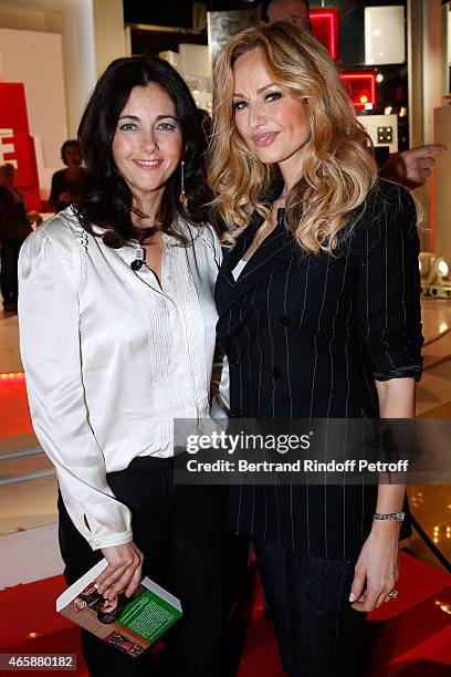 Actresses Cristiana Reali and Adriana Karembeu attend the 'Vivement Dimanche' French TV at Pavillon Gabriel on March 11, 2015 in Paris, France.