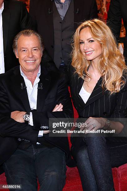 Main guest of the show Humorist Michel Leeb and Adriana Karembeu attend the 'Vivement Dimanche' French TV at Pavillon Gabriel on March 11, 2015 in...