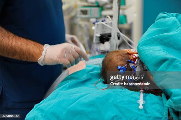 pediatric surgeon - pediatric intensive care unit stock pictures, royalty-free photos & images