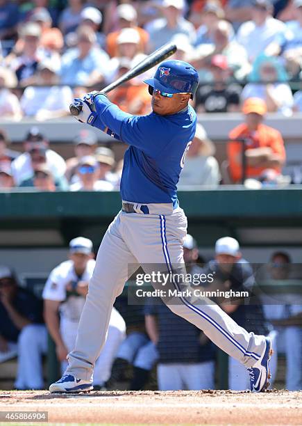 Ramon Santiago of the Toronto Blue Jays bats during the Spring Training game against the Detroit Tigers at Joker Marchant Stadium on March 9, 2015 in...