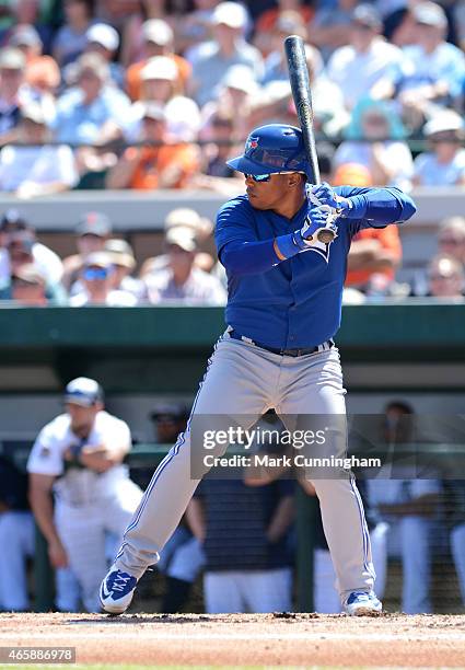 Ramon Santiago of the Toronto Blue Jays bats during the Spring Training game against the Detroit Tigers at Joker Marchant Stadium on March 9, 2015 in...