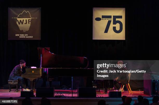 American Jazz pianists Robert Glasper and Jason Moran play dual pianos at the Blue Note Records 75th Anniversary Concert during the 2014 NYC Winter...