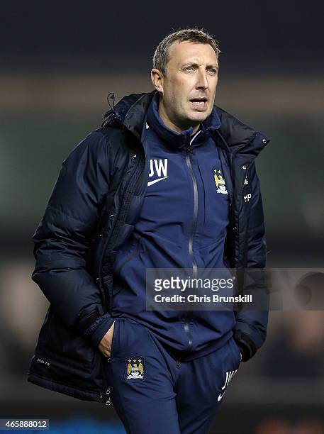 Manchester City coach Jason Wilcox looks on during the FA Youth Cup Semi Final First Leg match between Manchester City and Leicester City at the...