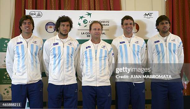 Argentina's tennis team players Carlos Berlocq and Juan Monaco, captain Martin Jaite and players Horacio Zeballos and Eduardo Schwank pose during the...