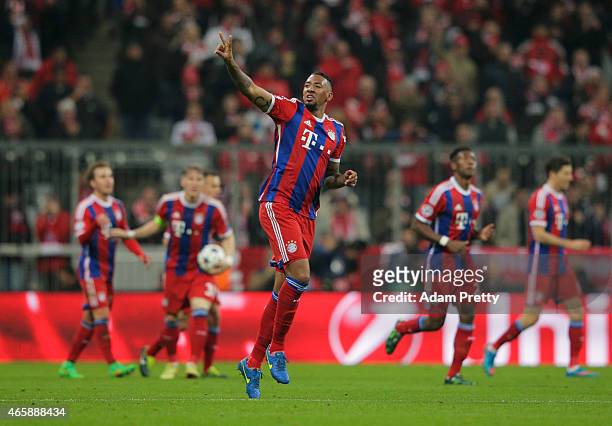 Jerome Boateng of Bayern Muenchen celebrates as he scores their second goal during the UEFA Champions League Round of 16 second leg match between FC...