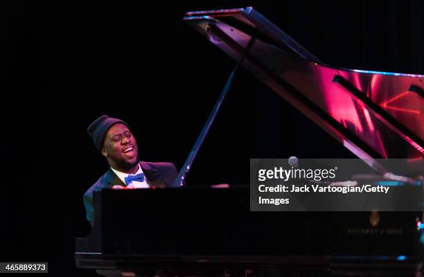 American Jazz pianists Robert Glasper plays piano at the Blue Note Records 75th Anniversary Concert during the 2014 NYC Winter JazzFest 10th...