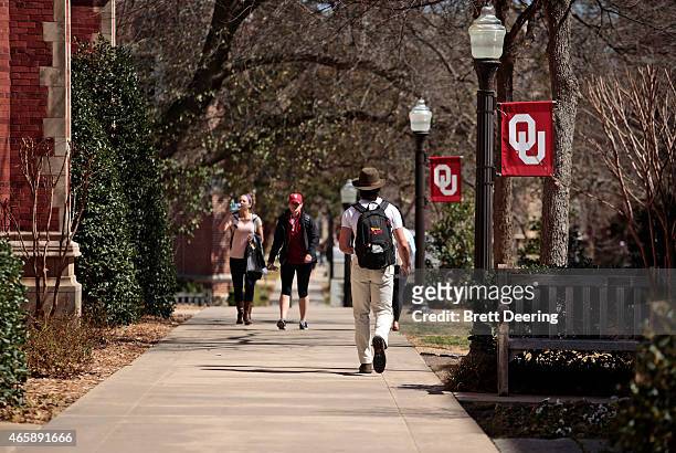 Students walk on campus between clases at the University of Oklahoma on March 11, 2015 in Norman, Oklahoma. Video showing Sigma Alpha Epsilon members...