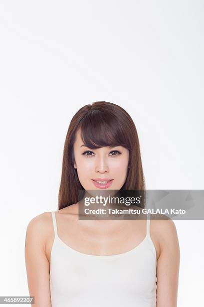 portrait of woman smiling - woman vest stock pictures, royalty-free photos & images