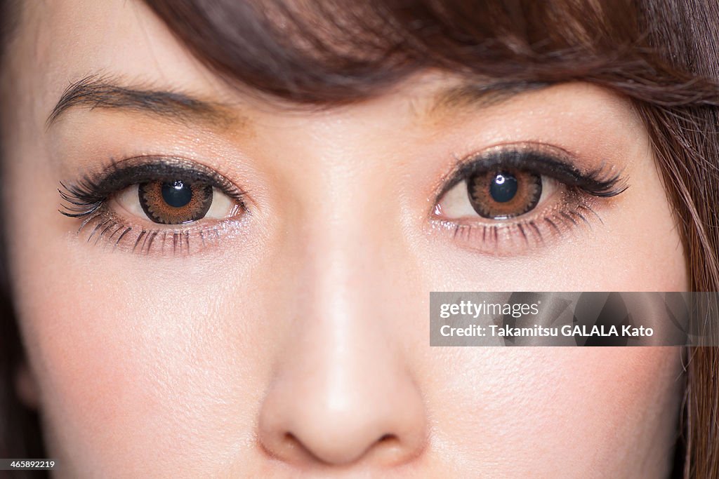 Portrait of woman with brown eyes close up