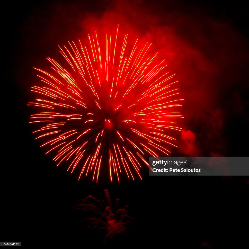 Fireworks exploding in night sky