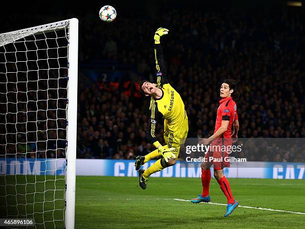 Goalkeeper Thibaut Courtois of Chelsea dives in vain as the header from Thiago Silva of PSG flies into his net to level the scores at 2-2 during the...