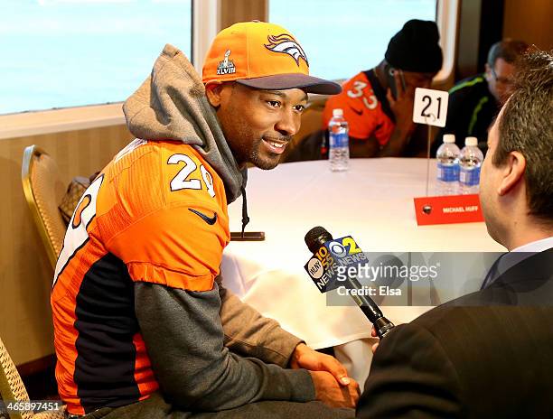Michael Huff of the Denver Broncos talks to reporters during Super Bowl XLVIII media availability on January 30, 2014 in Jersey City, New Jersey. The...