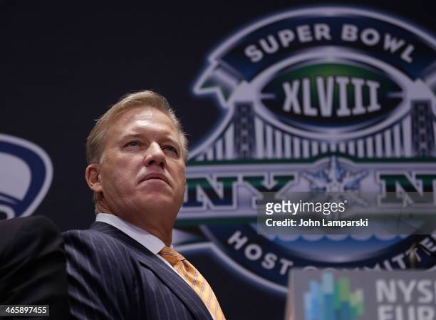 Executiive VP of Football operatiohns, Denver Broncos, John Elway rings the opening bell at New York Stock Exchange on January 30, 2014 in New York...