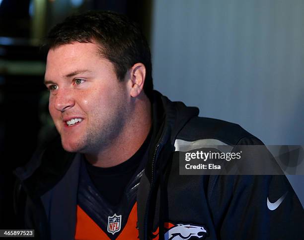 Mitch Unrein of the Denver Broncos addresses the media during Super Bowl XLVIII media availability on January 30, 2014 in Jersey City, New Jersey....