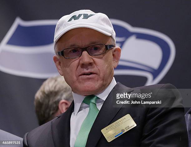 Jets Onwer Woody Johnson rings the opening bell at New York Stock Exchange on January 30, 2014 in New York City.