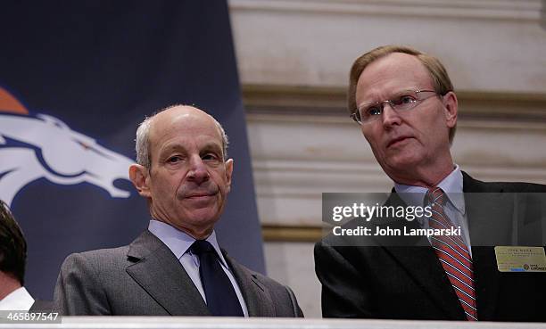 Co- owner of the NY Giants John Tisch and Co-owner of the NY Giants John Mara ring the opening bell at New York Stock Exchange on January 30, 2014 in...
