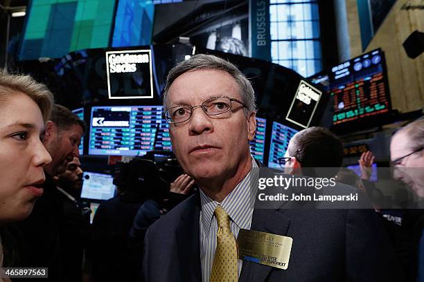 President and CEO of the Super Bowl Host Committee Al Kelly rings the opening bell at New York Stock Exchange on January 30, 2014 in New York City.