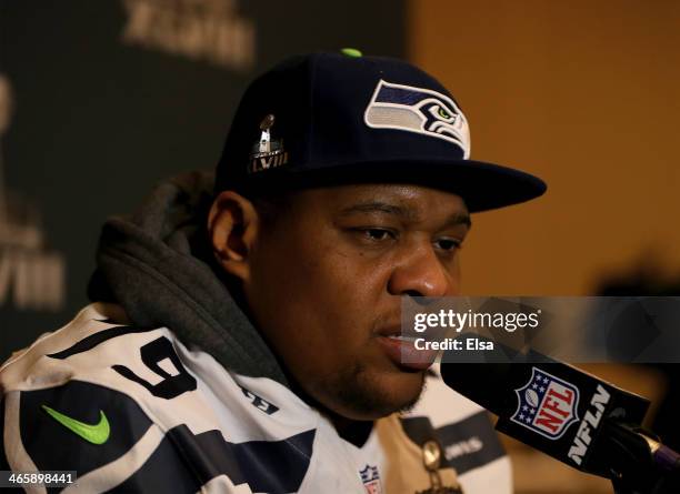 Red Bryant of the Seattle Seahawks addresses the media during Super Bowl XLVIII media availability at the Westin Hotel January 30, 2014 in Jersey...