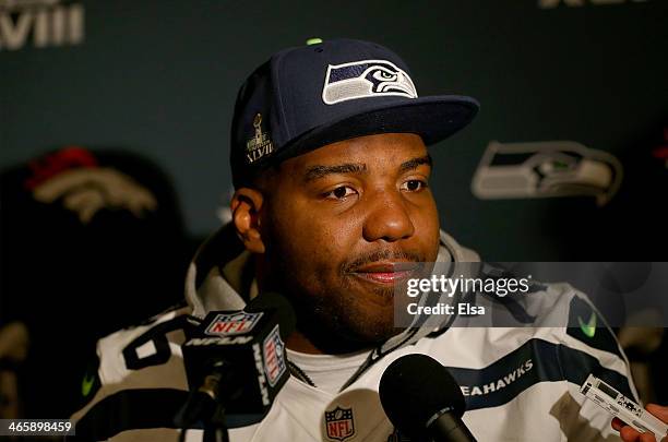 Russell Okung of the Seattle Seahawks addresses the media during Super Bowl XLVIII media availability at the Westin Hotel January 30, 2014 in Jersey...