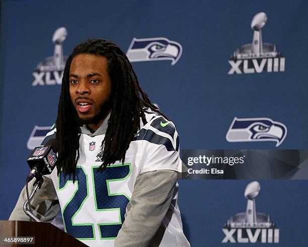 Richard Sherman of the Seattle Seahawks addresses the media during Super Bowl XLVIII media availability at the Westin Hotel January 30, 2014 in...