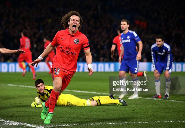 David Luiz of PSG celebrates after teammate Thiago Silva of PSG scores a goal to level the scores at 2-2 during the UEFA Champions League Round of...