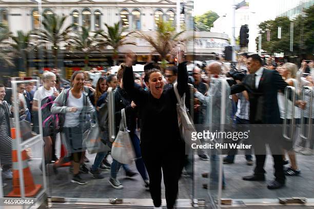 The first customer is let through the doors on the opening day of New Zealand's first TopShop and TopMan store on March 12, 2015 in Auckland, New...