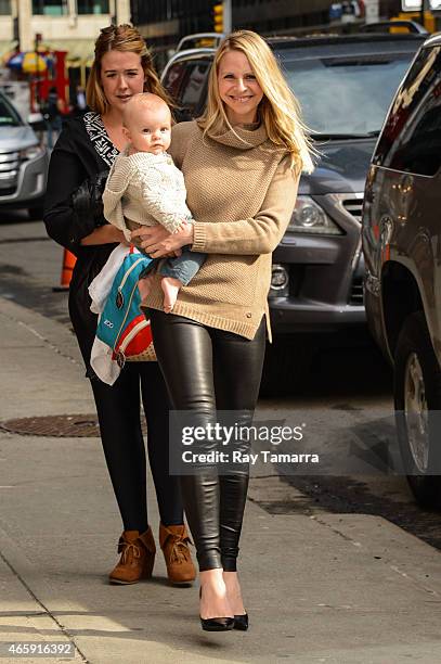 Kayte Walsh and Kelsey Gabriel Elias Grammer enter the "Late Show With David Letterman" taping at the Ed Sullivan Theater on March 11, 2015 in New...