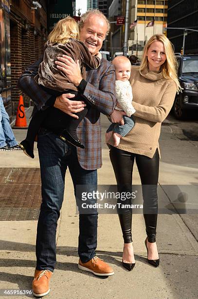 Faith Grammer, actor Kelsey Grammer, Kelsey Gabriel Elias Grammer, and Kayte Walsh enter the "Late Show With David Letterman" taping at the Ed...
